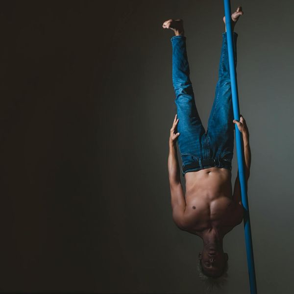 Athlete showing flexibility and core strength in a calm environment.